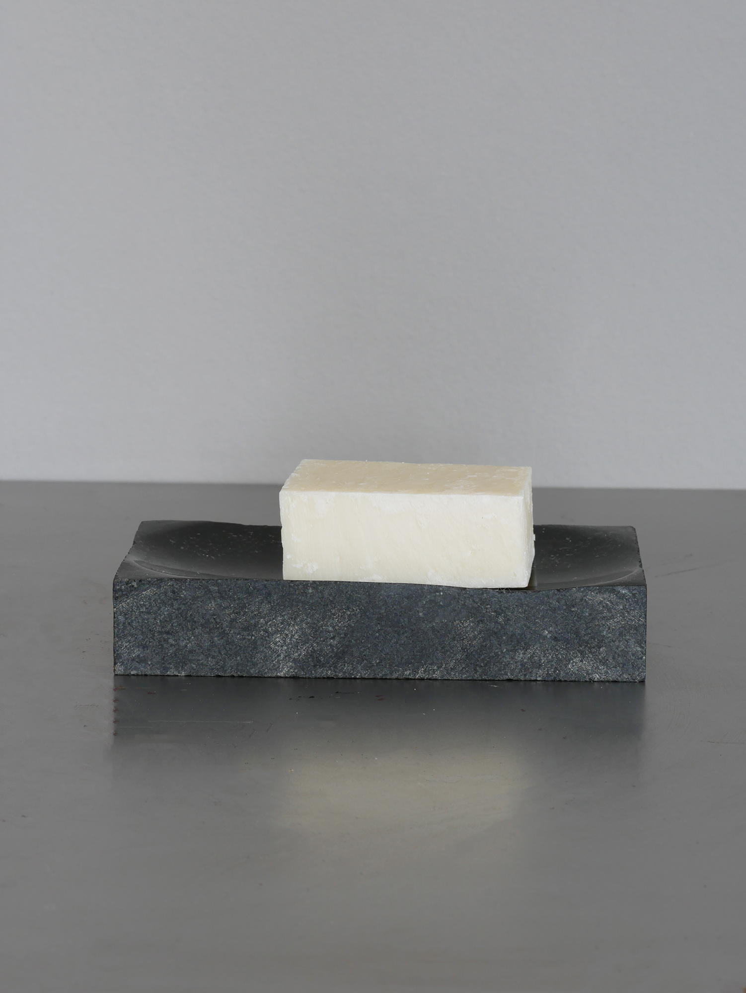 Salt soap, handmade with sea salt, on a clay dish